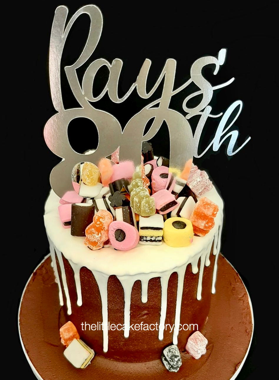 Liquorice drip cake Cake | Celebration Cakes